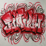 Close-up of original hand-airbrushed red-and-white graffiti name lettering with black dimensional shadows and red and black swirls on white fabric.